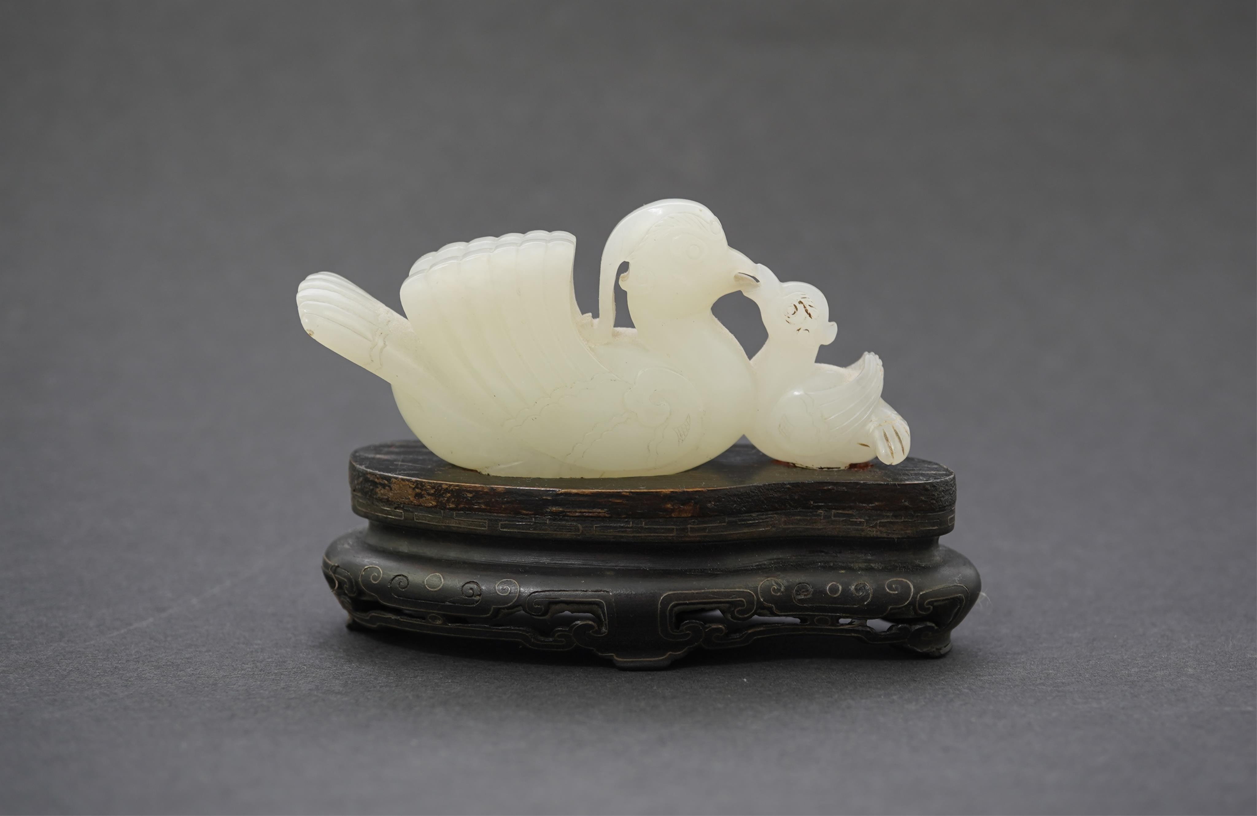 A Chinese white jade mandarin duck group, 18th/19th century
